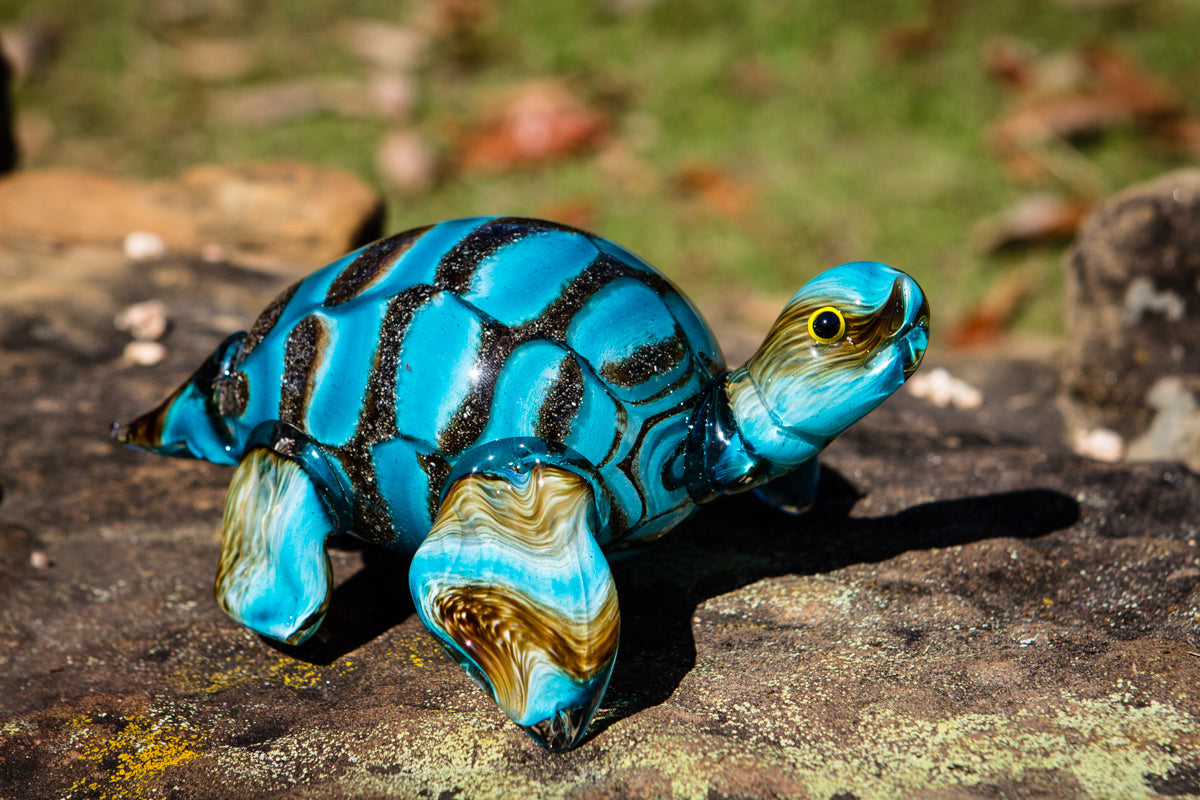 glass turtle with cremation ashes